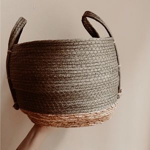 Large green woven green and natural jute basket with handles